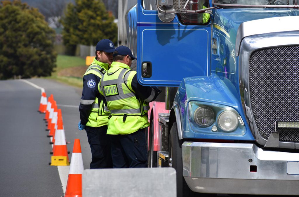 Where are the heavy vehicle checking stations located?